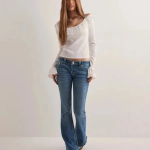 True Religion x Nelly Ultra low rise jeans - Selling True Religion x Nelly 'ultra low rise joey flare sn' jeans in w23! I've used these only a few times and they are in good condition👍Feel free to ask for details or more pictures!!