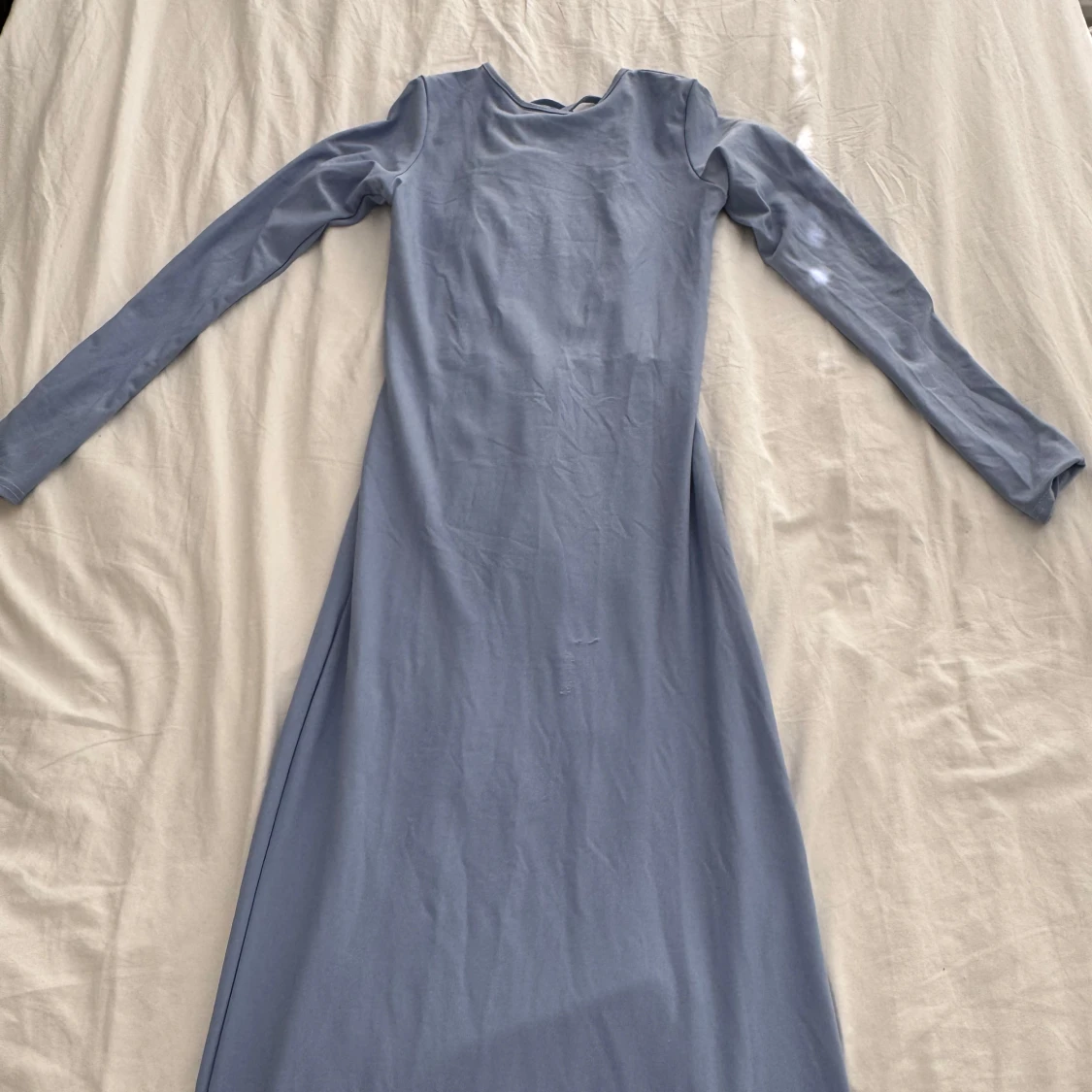 Ljusblå långklänning med snörning