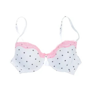 BH Victoria's Secret PINK  - Supersöt bh från Victoria's Secret PINK i vitt med svarta prickar och rosa spets upptill. Bh:n har justerbara axelband och bygel för extra stöd. 