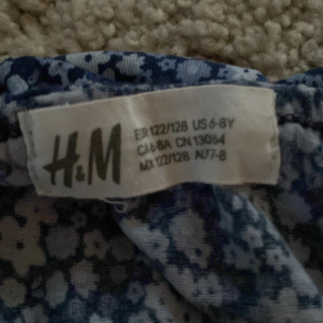 Blommig blå klänning från H&M - 1