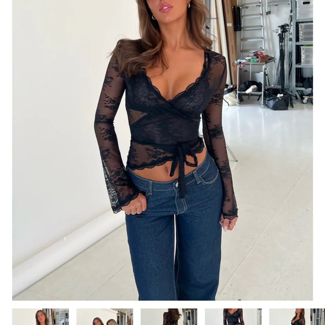 Svart spetsig omlottopp från Venderby's - 2