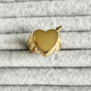 Heart Ring  - The ring is never used and 100% rust- and nickel-free. The ring is  adjustable so it will fit everyone! If you have any questions, feel free to reach out ☺️