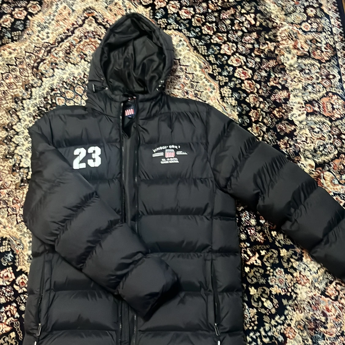 Svart pufferjacka från Vinson, M