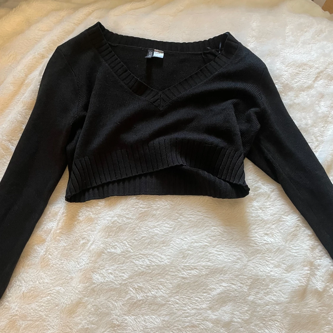 Svart croppad stickad tröja från Divided