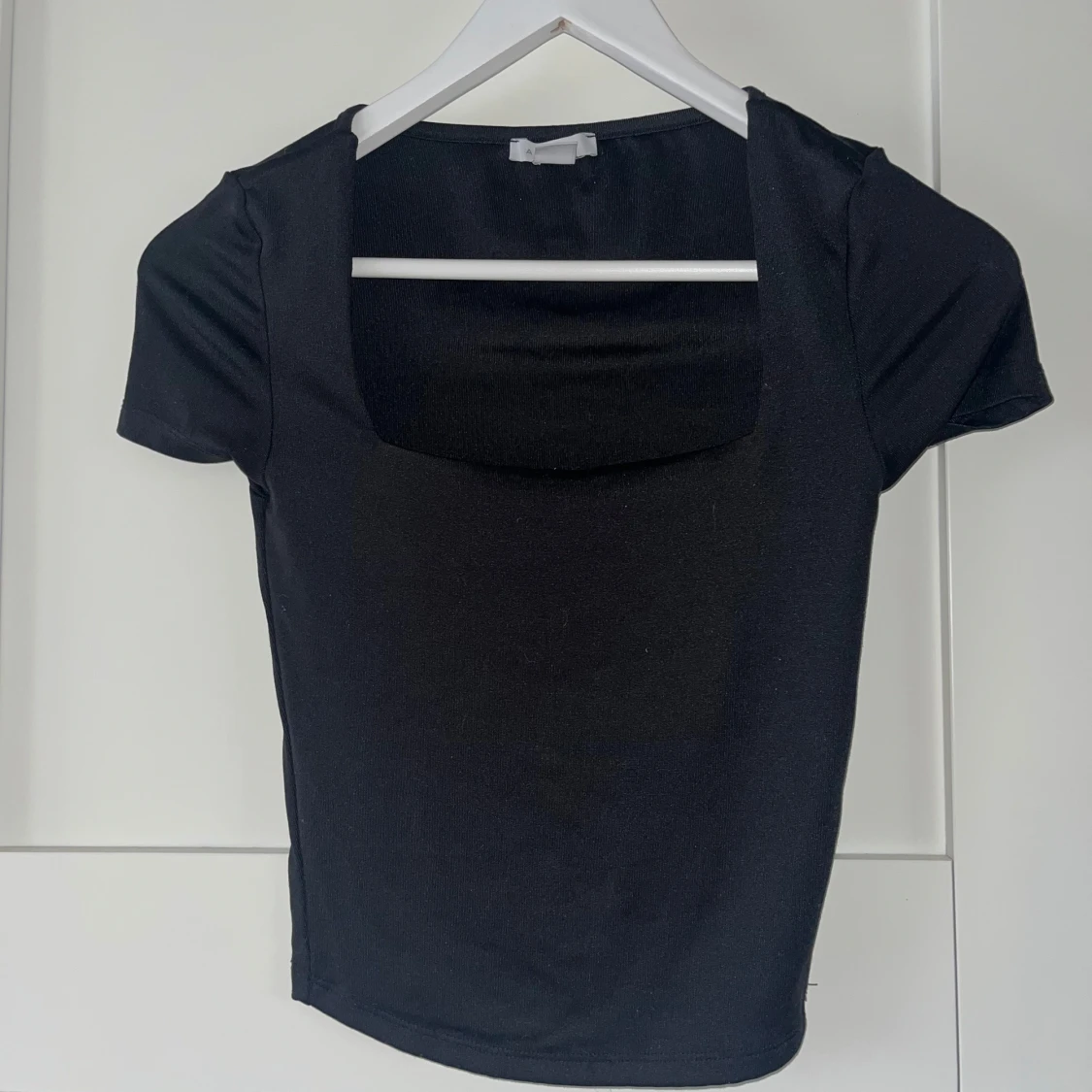 Svart kortärmad topp