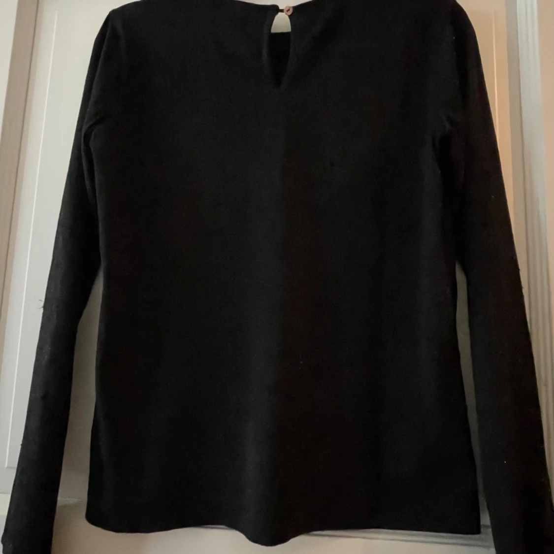 Svart glittrig långärmad topp från Petit by Sofie Schnoor - 1