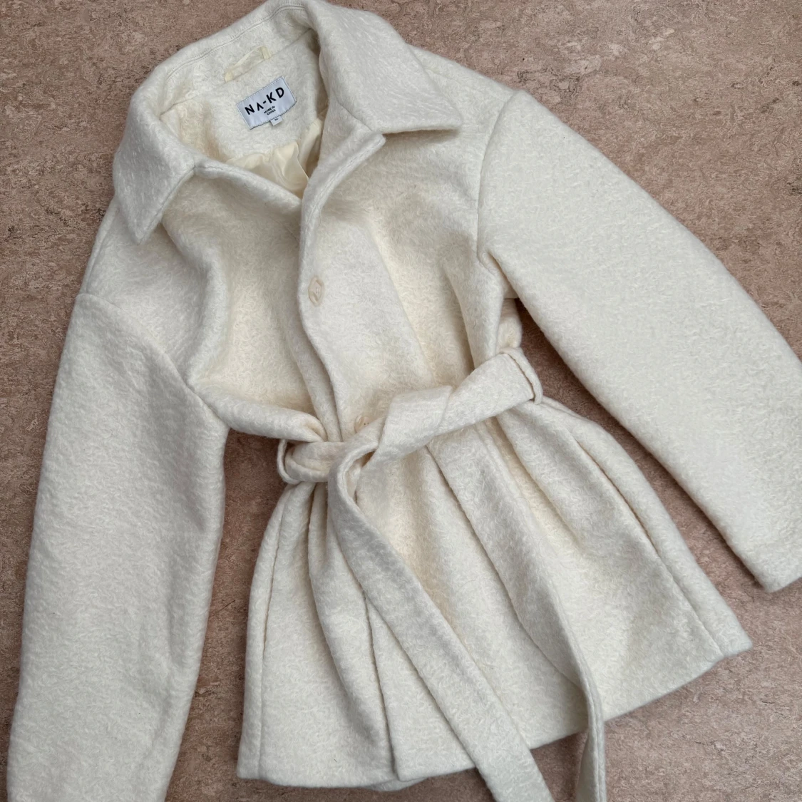 Vit kappa från NA-KD