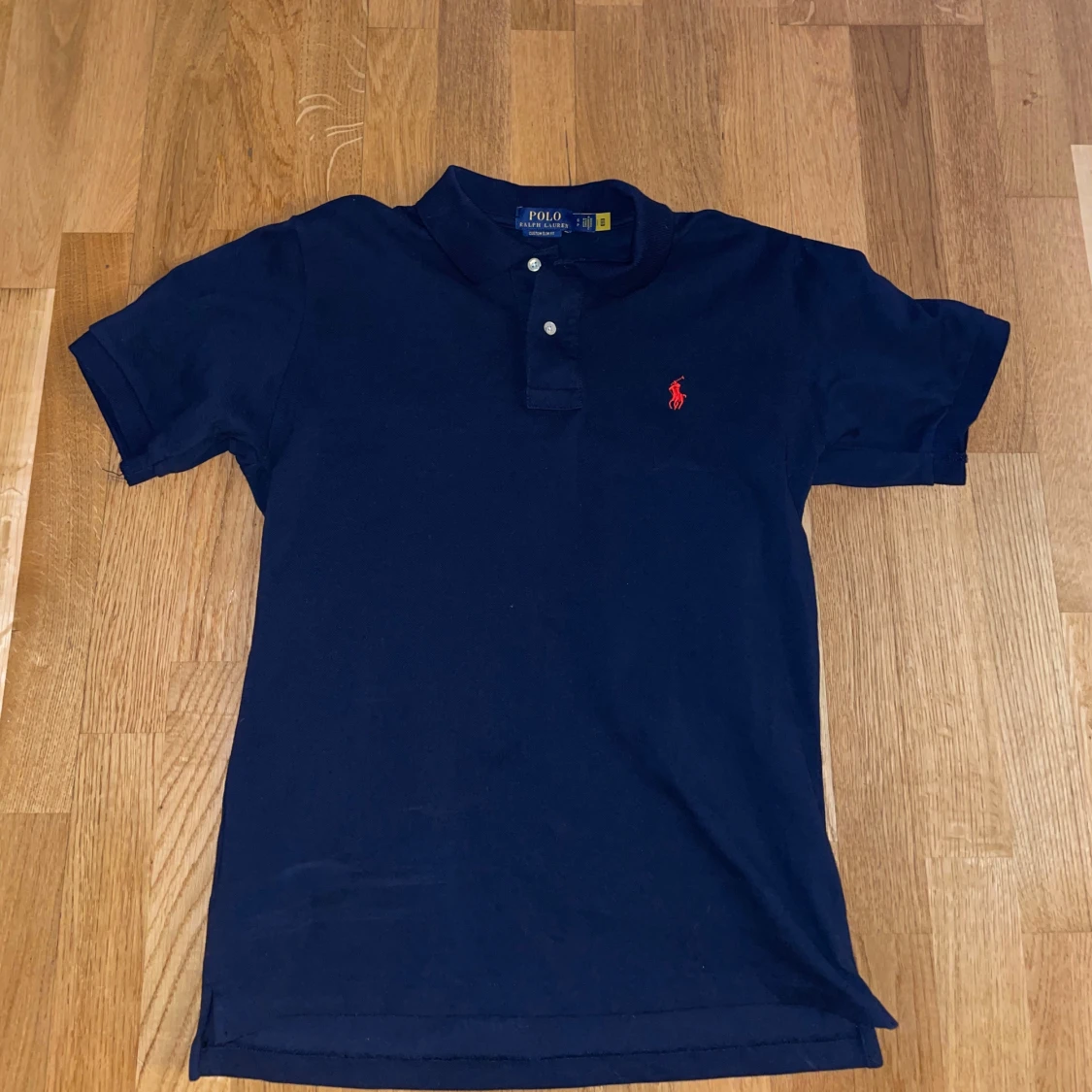 Mörkblå pikétröja från Polo Ralph Lauren