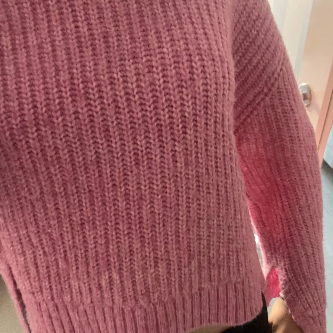 Rosa stickad tröja från Gina Tricot