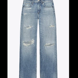 Blå slitna wide jeans - Jeans