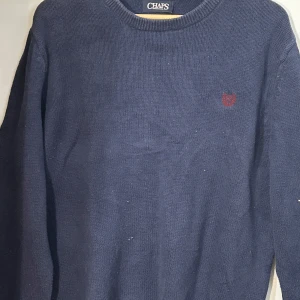 Navy CHAPS Ralph Lauren sweater  - 🎨Irl Colour: dark grey   📏UK Size: M (please measurements for reassurance)  📐Measurements  Length 67 Shoulder width 49  🧵Material: 100% Cotton  BUY NOW IS ON  Thanks,