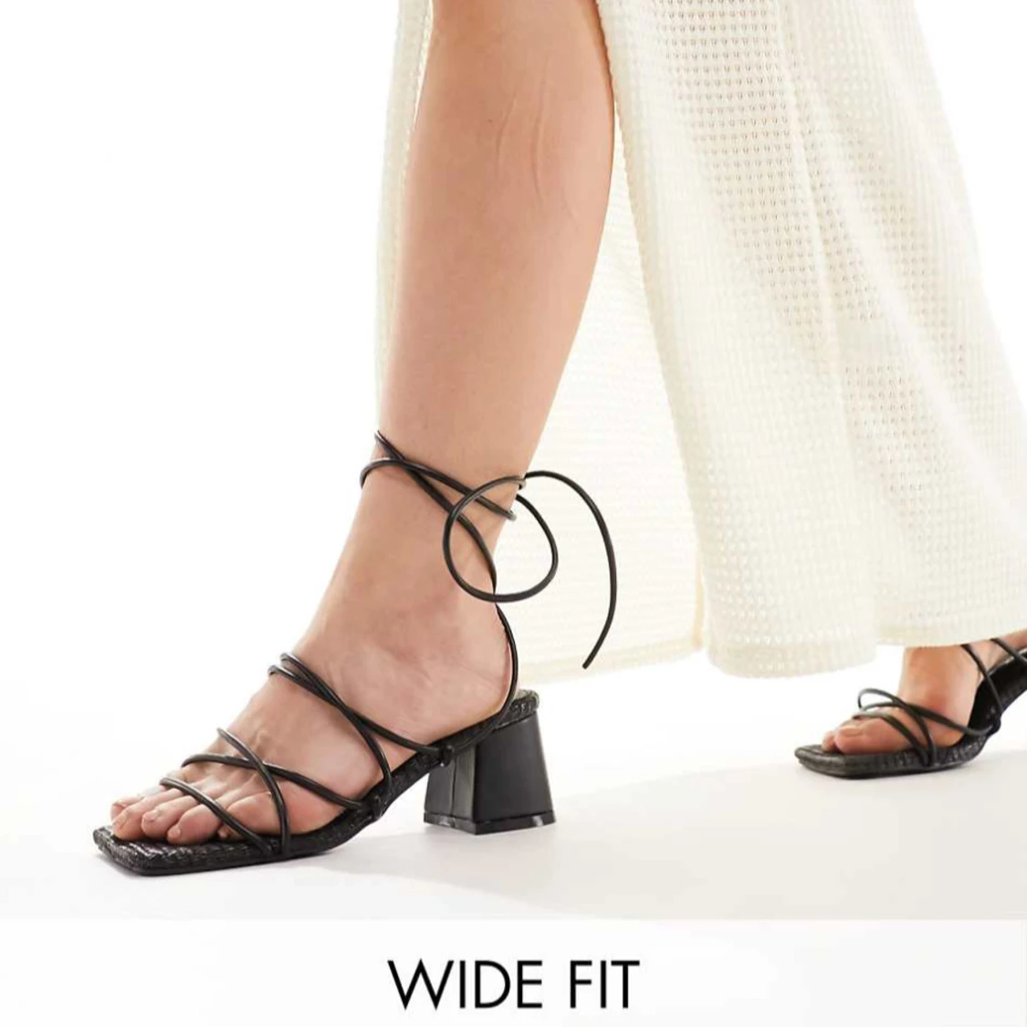 Svarta sandaler med klack