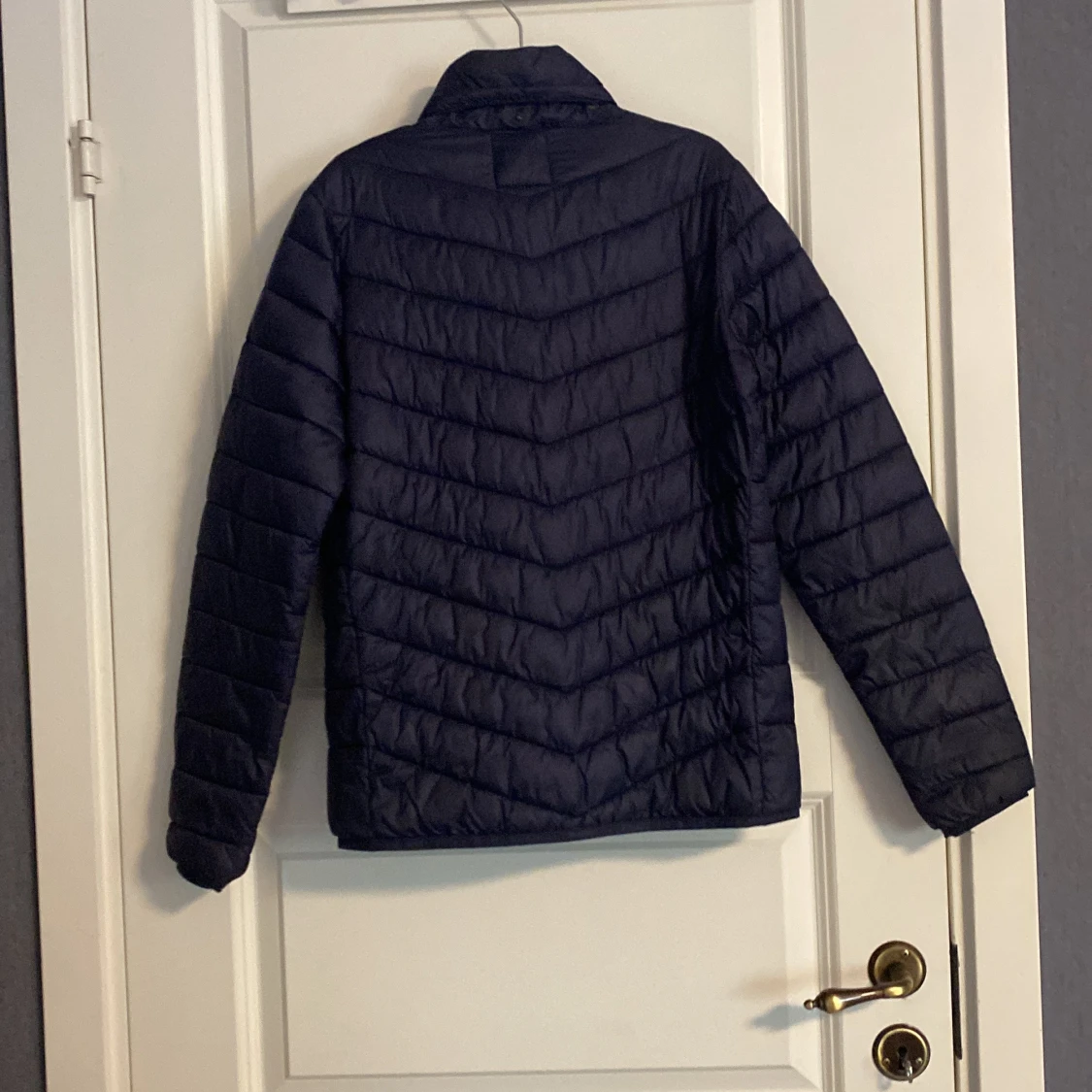 Mörkblå dunjacka från McKinley - 1