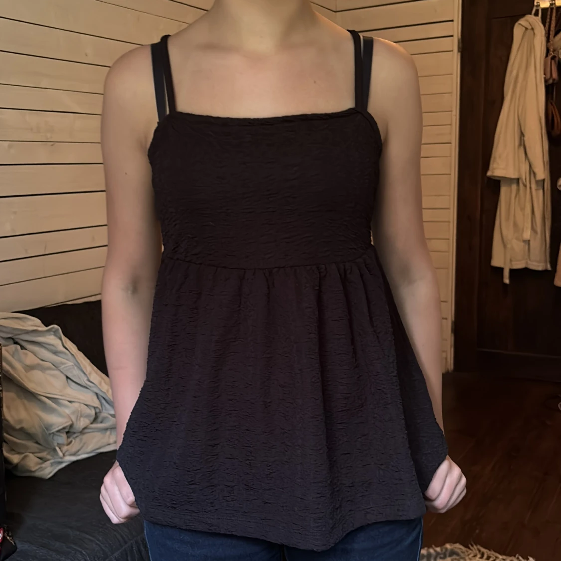 Svart linnetopp med struktur