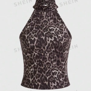 Leopardmönstrad halterneck topp från SHEIN - Super fin tröja från shein i fint material. Använd 2 gånger 