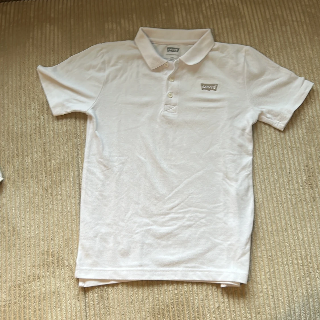 Vit piké t-shirt från Levi's