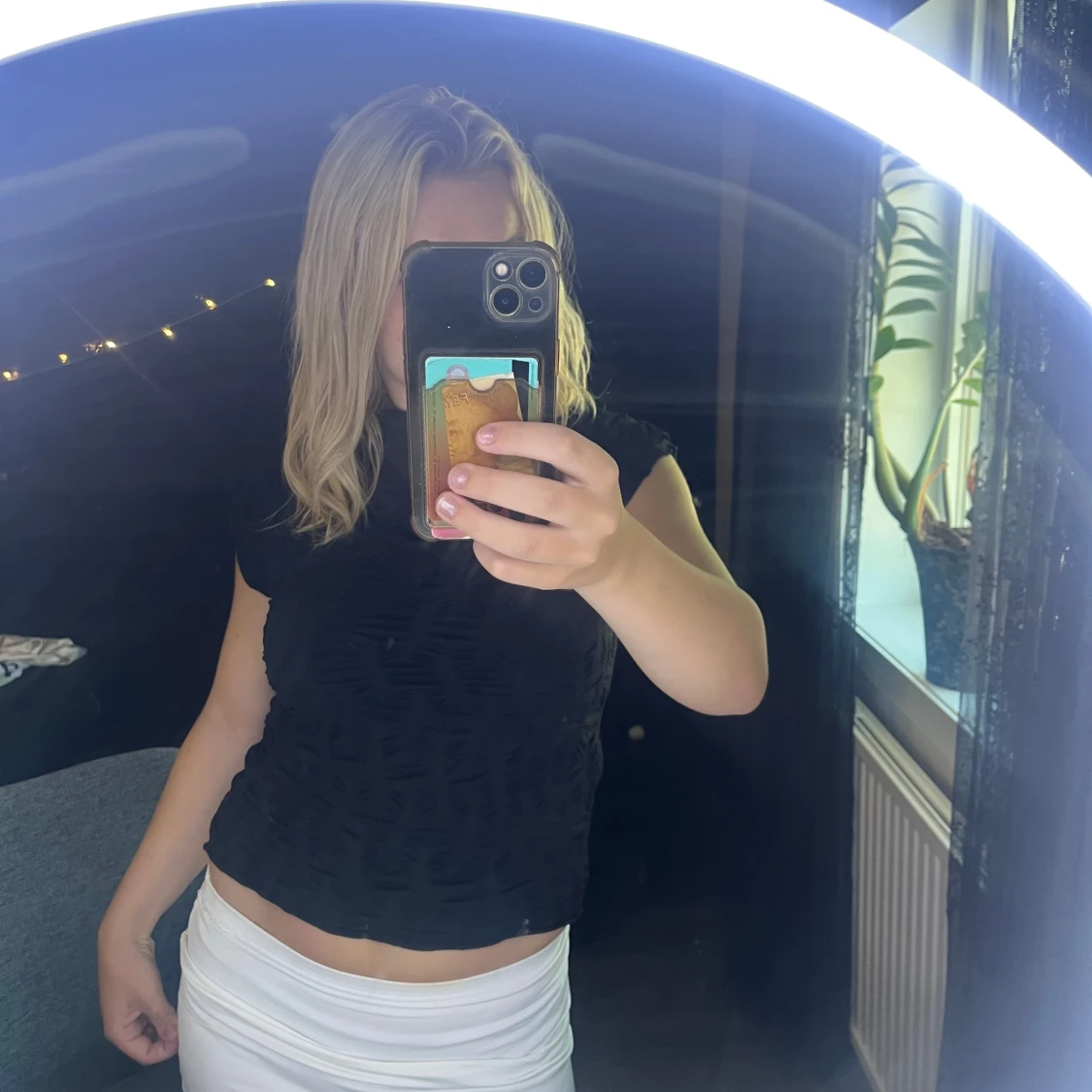 Svart söt topp med kort ärm