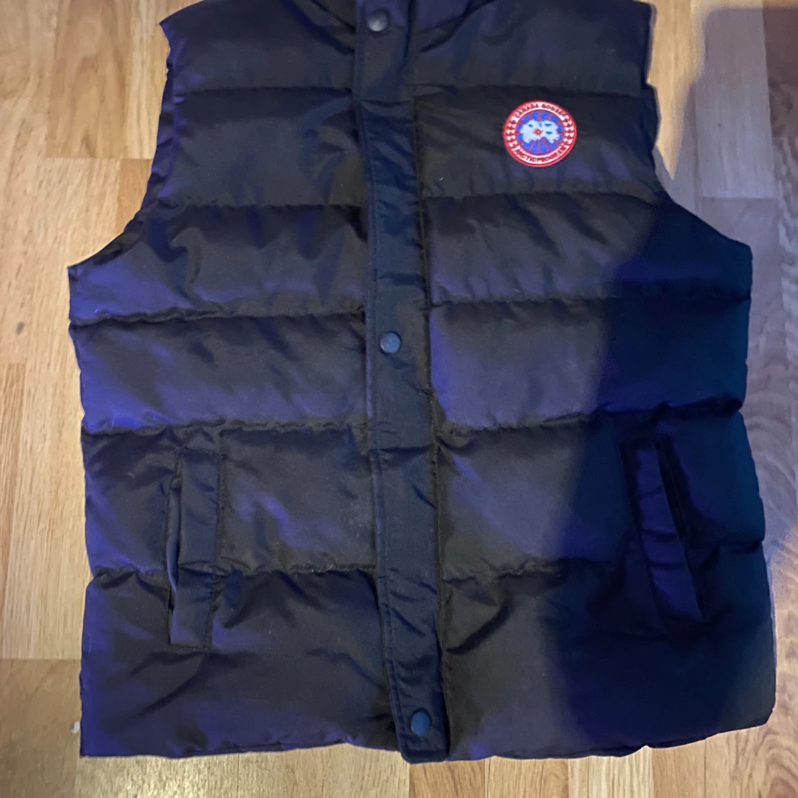 Svart dunväst från Canada Goose
