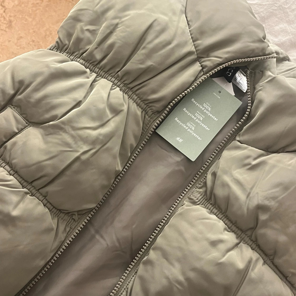 Beige dunväst från H&M - 2