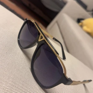 Glasögon  - Snygga solglasögon