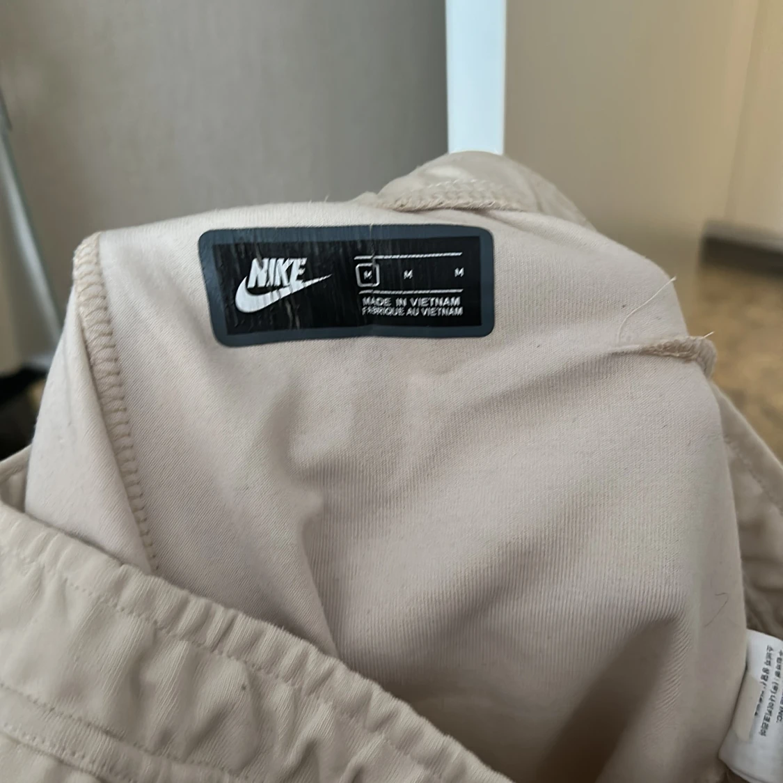 Beige mjukisbyxor från Nike, M - 3
