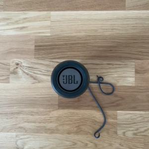 JBL Flip Essential Speaker - It’s used but still in excellent condition. It has no defects and does NOT come with a charger.