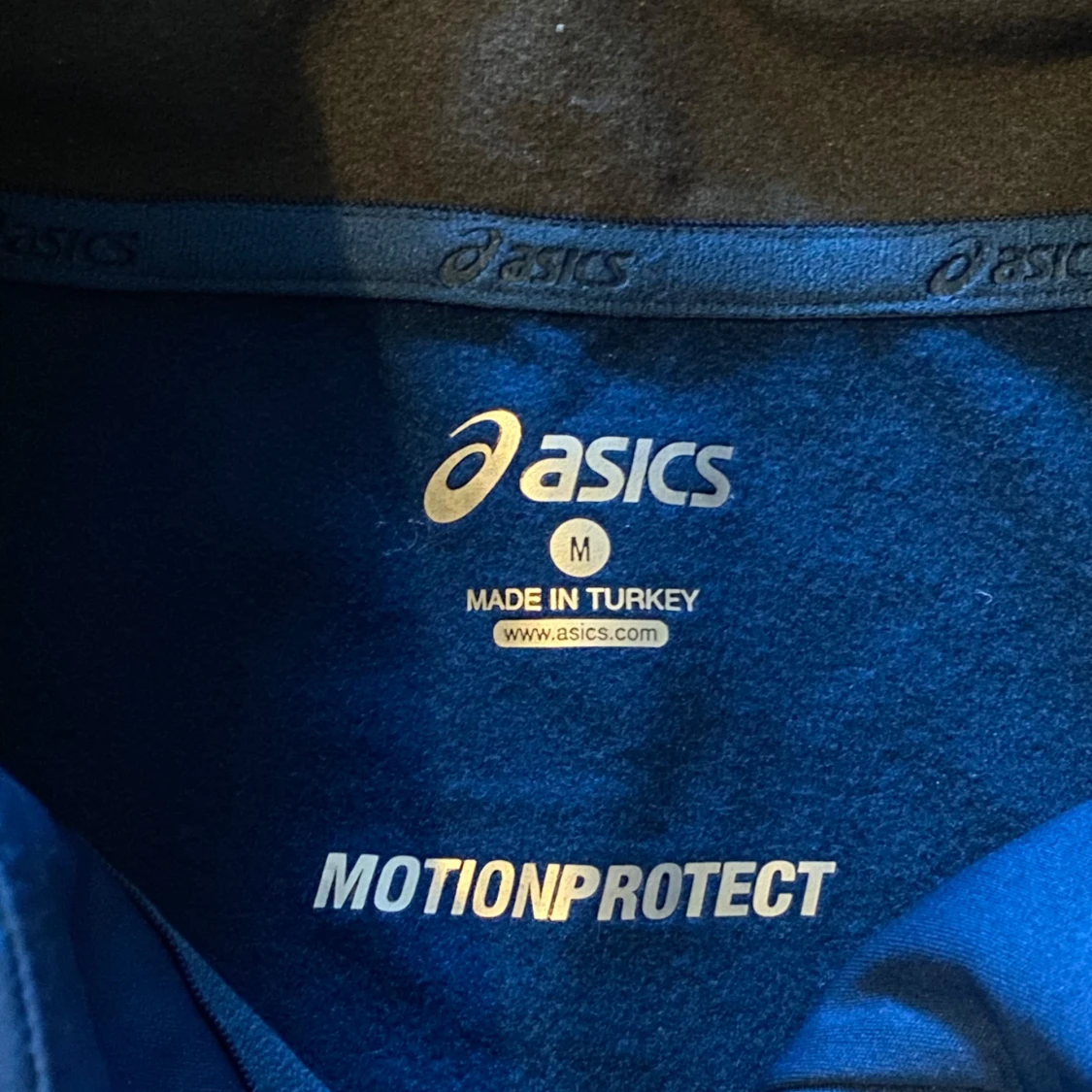 Blå träningshoodie från Asics M - 1