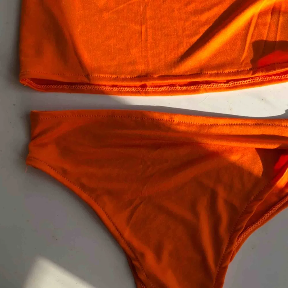 Superfin helt oanvänd orange bikini i storlek S. Övrigt.