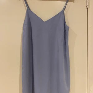 Klänning XS  - Fin skön klänning i storlek XS, passar även S-M. 