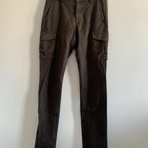 Gant byxor - Brun svarta Gant byxor storlek 30/34 använd fåtal gånger 