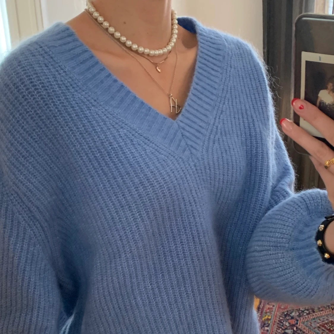 Blå stickad tröja i mohair 