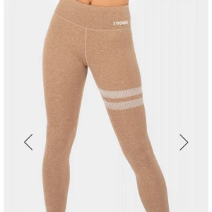 Träningstights från Stronger - Beige träningstights från Stronger, använda fåtal gånger