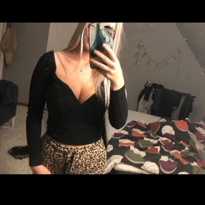 En svart fin topp - En fin topp med lite urringnin