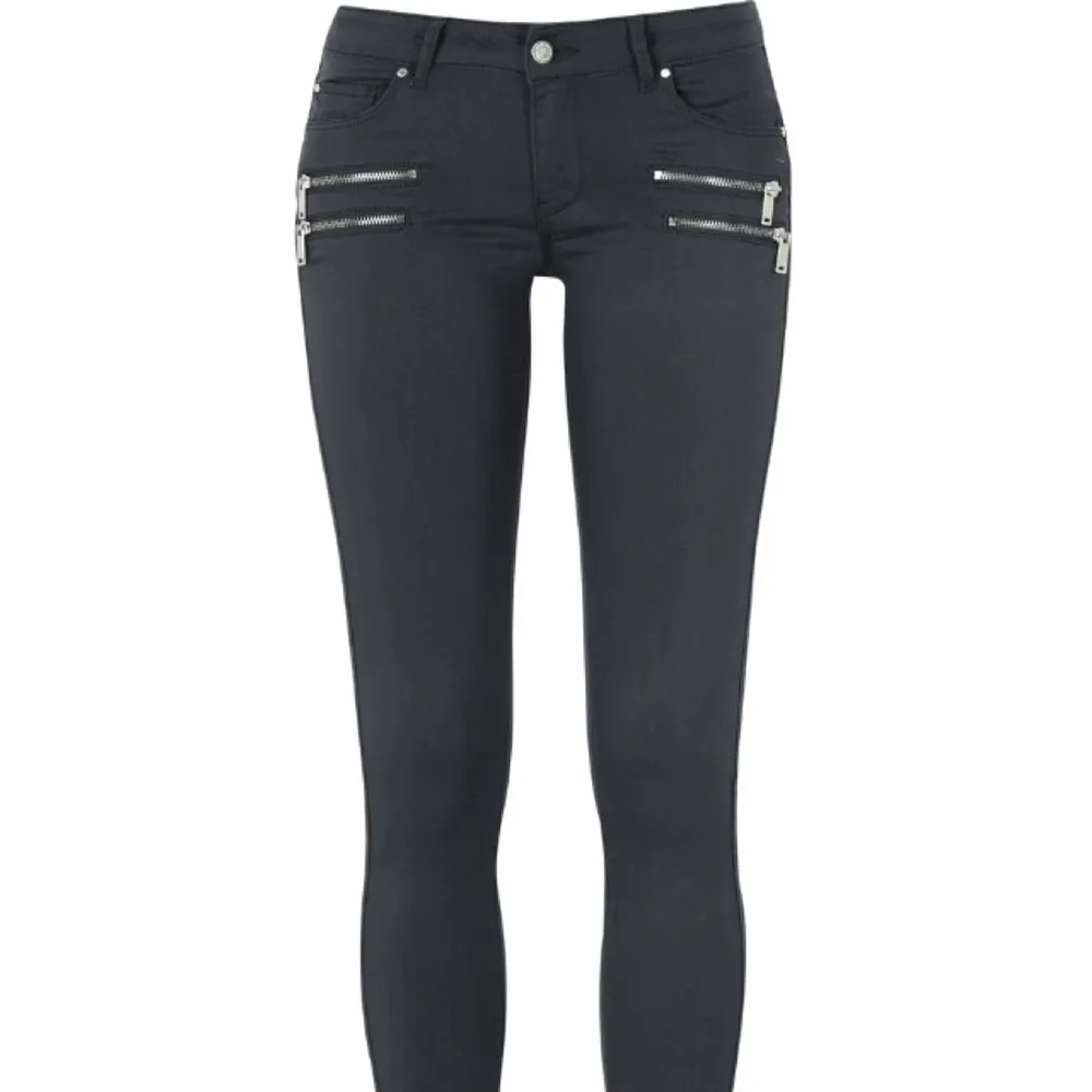 Mörkgrå byxor med dragkedjor från Gina Tricot. Som nya, använda vid endast något tillfälle. . Jeans & Byxor.