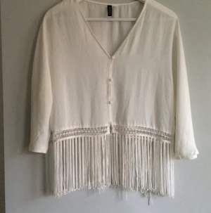  - Fin halvtransparent topp från H&M.
