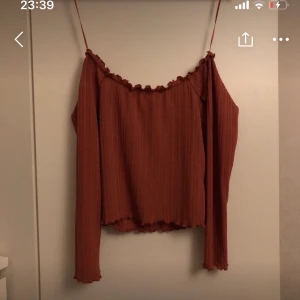 Topp - Med bara axlar