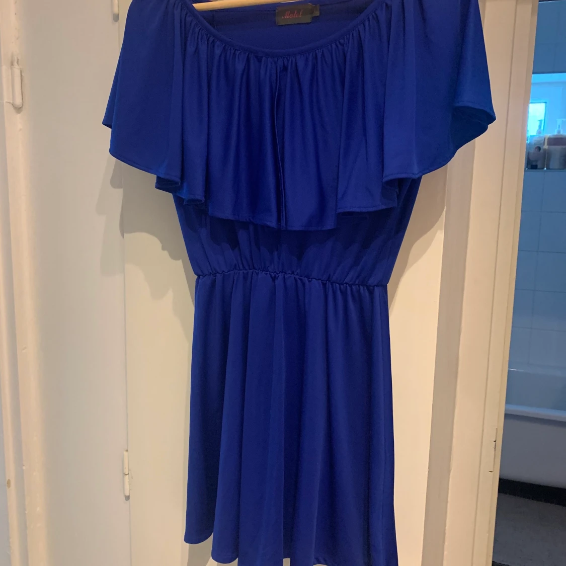 En blå kort klänning - 90