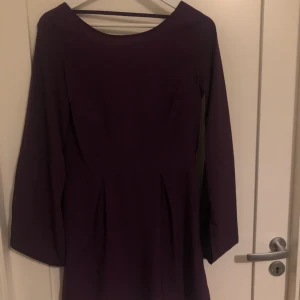  - Beautiful summer female dress, backless, openings by the end of the sleeves, zipper on the side