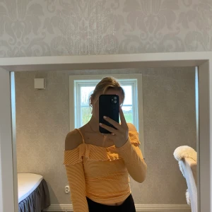 Orange/randig topp - Använd kanske 1 gång.