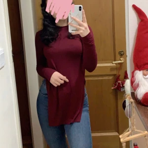 Tröja från Nelly - Tröja från nelly med slits vid sidan, i storlek xs.