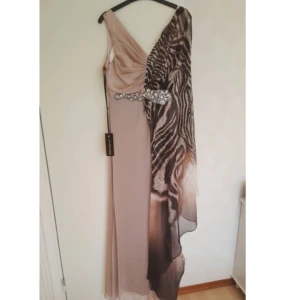  - Size: 42 Colour: Brown Band: fidan abiye Was not worn! New!