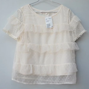 Topp H&M - oanvänd H&M barn storlek (164cm) eller size xs-s