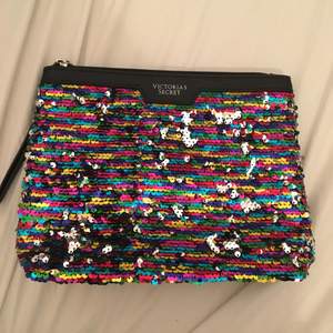 sequined clutch from VS. multicolored and silver (it changed when rubbed upwards)