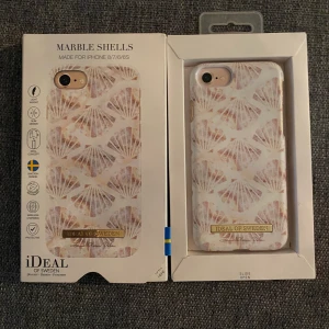 Ideal of Sweden skal Iphone 6/7/8 - Limited edition (finns inte att köpa längre) skal från ideal of Sweden i toppskick💗 skalet har snäckor på sig och är väldigt somrigt☀️passar iphone 6/7/8 nypris: 300kr   Mitt pris:150kr