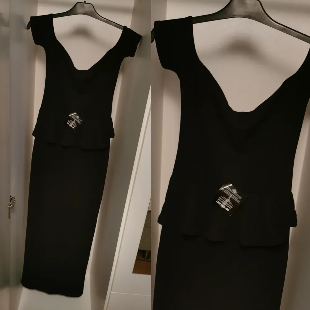 Fin lång svart klänning från nelly aldrig blivit använd. . Klänningar.