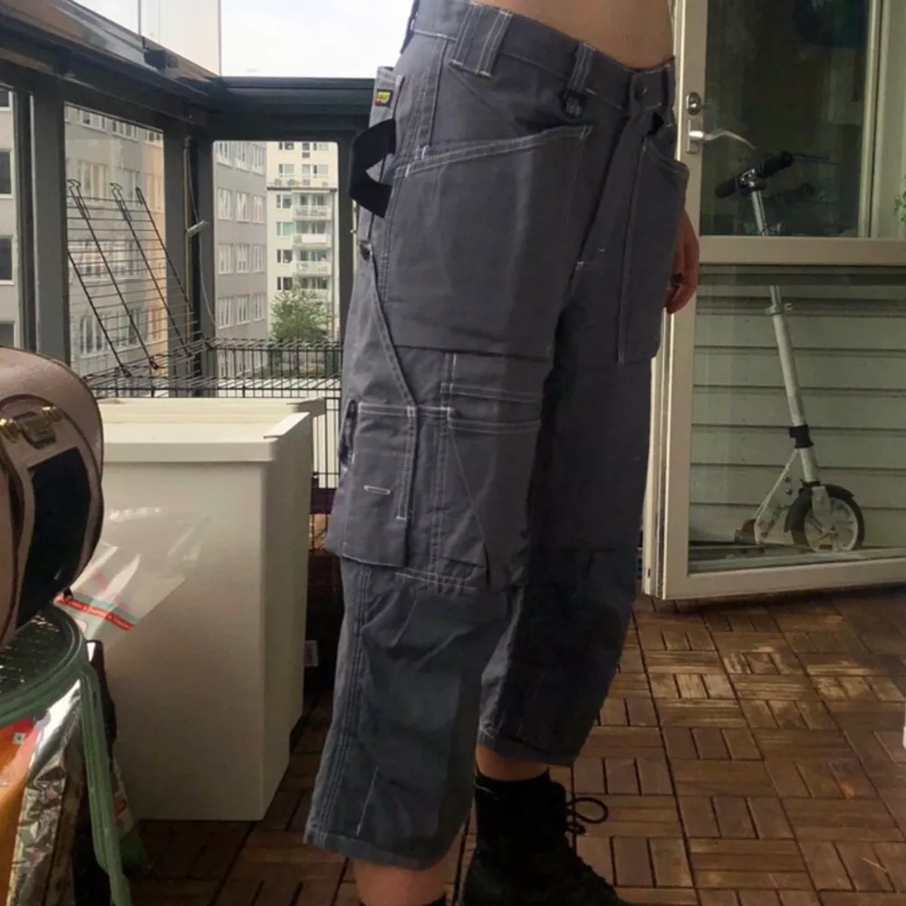 thrifted cargo pants from Blå Kläder!! can be used for fashion as well as for construction work :))   measurments are listed below!  waist: 68 cm hips: 96 cm length: 76 cm  ~please message me before buying the item~ . Jeans & Byxor.