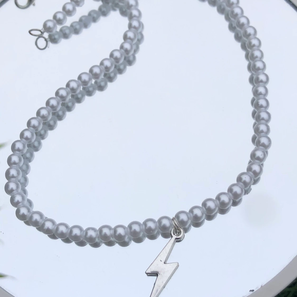 pärlhalsband med blixt