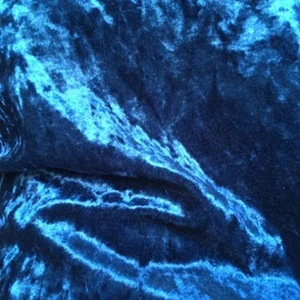  - I mörkturkost krossat sammet. Köpte den i flera storlekar över för oversized fit. Är själv en 36:a. 