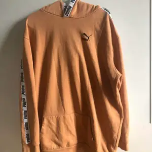 Pastel orange puma hoodie bought in London! In great condition! My price is flexible.