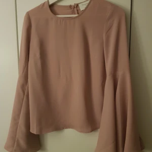  - Puderrosa blus